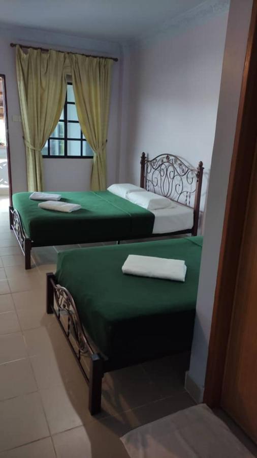 Kanza Beach Inn Marang Kültér fotó
